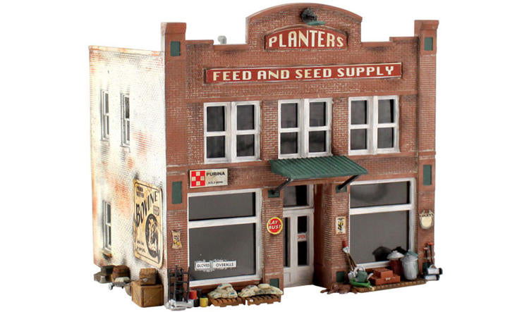 Chargez l&#39;image dans la visionneuse de la galerie, Woodland Scenics Planters Feed and Seed Supply - Landmark Structures(R) -- Kit - 4-19/32 x 3-5/8 11.7 x 9.2cm
