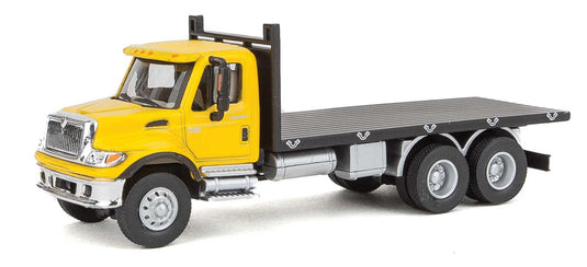 Walthers SceneMaster International 7600 3-Axle Flatbed Truck - Yellow Cab, Black Flatbed