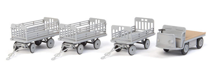 Walthers SceneMaster HO Baggage Tractor and Trailers - Plastic Kit - Non-Powered Tractor and 3 Trailers (gray)