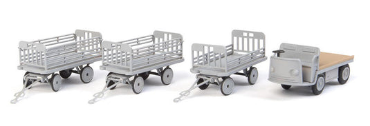 Walthers SceneMaster HO Baggage Tractor and Trailers - Plastic Kit - Non-Powered Tractor and 3 Trailers (gray)